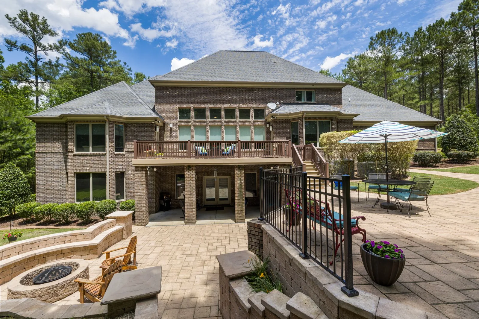 stone paver patio with seating wall
